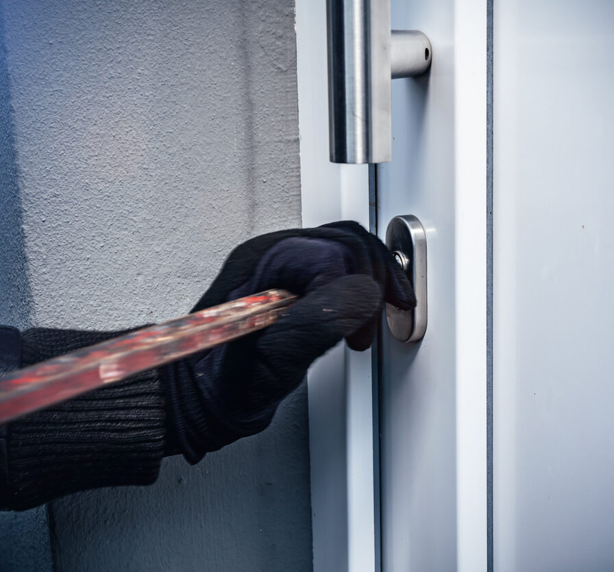 masked burglars breaking and entering into a victim's home